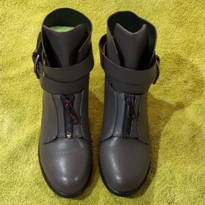 Elegant Black Ankle Boots with Buckle And Heel Detail By Annibeila.